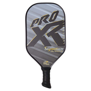 The ProXR Signature "The Wall" 14  Pickleball Paddle features a gold and grey graphic design on a 3k carbon fiber weave face and 14mm poly core. Short 4-inch handle is great for table tennis grip-style players. Ranging in weight from 8.0 - 8.4 ounces.